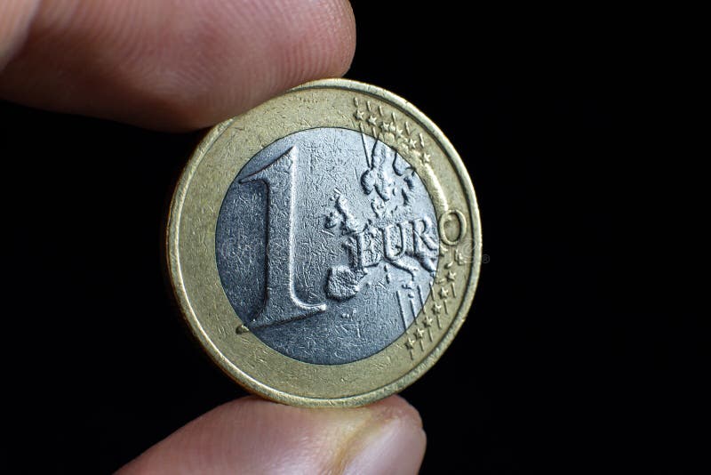 Foto voor afsluiting van één euro. macromunten stock afbeelding