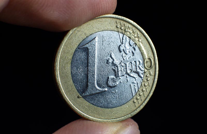Foto voor afsluiting van één euro. macromunten stock afbeelding