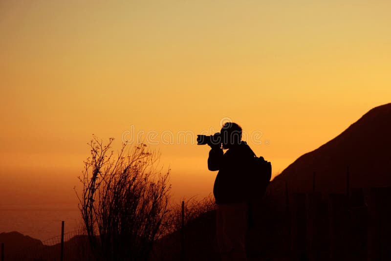 Silhouet van fotograaf stock foto's Silhouet van fotograaf stock foto's