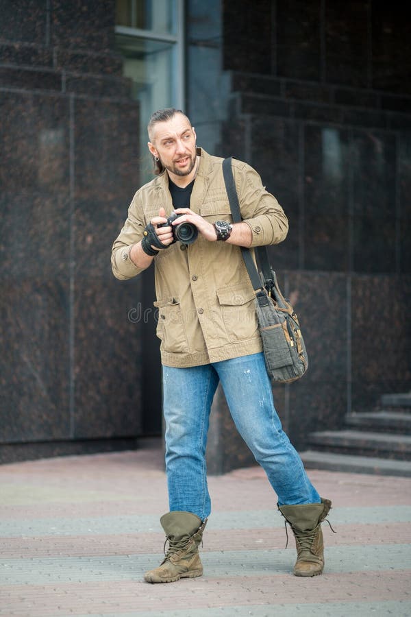 Fotografera för gemene man royaltyfri foto Fotografera för gemene man royaltyfri foto