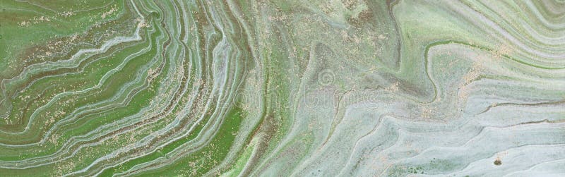 Fotografia fundalului abstract cu efect marbleizat. culori creative verzi și albe. vopsea frumoasă royalty free stock photo