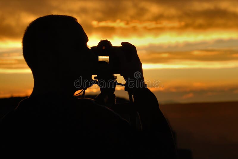 Fotografo di tramonto immagini stock Fotografo di tramonto immagini stock