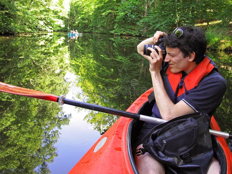 Fotografo in kajak fotografie stock Fotografo in kajak fotografie stock