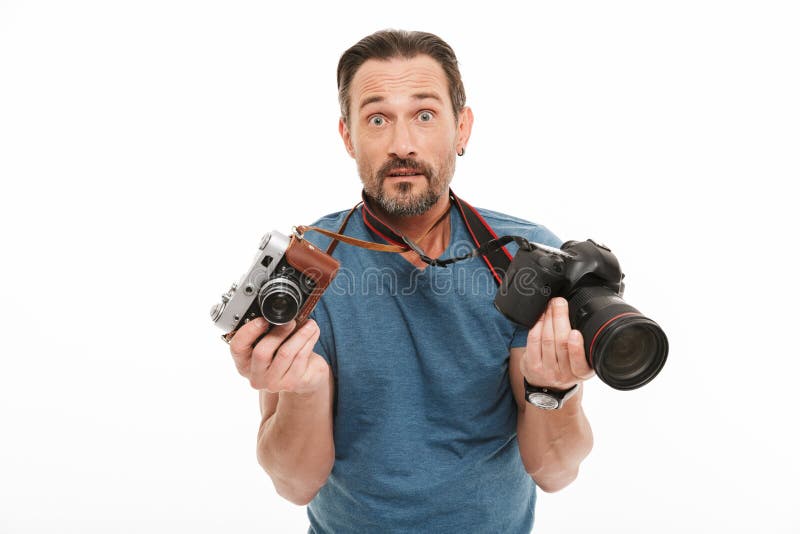 Fotografo maturo colpito dell'uomo fotografia stock libera da diritti Fotografo maturo colpito dell'uomo fotografia stock libera da diritti