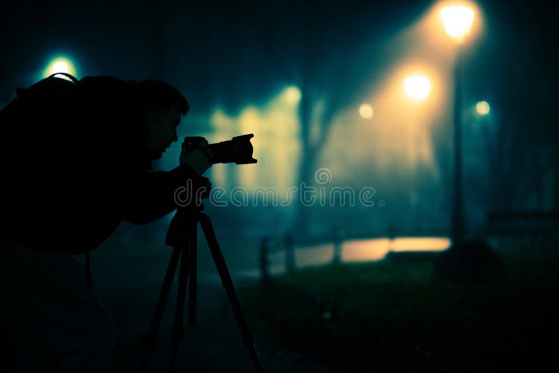 Fotógrafo de Noite fotografia de stock royalty free
