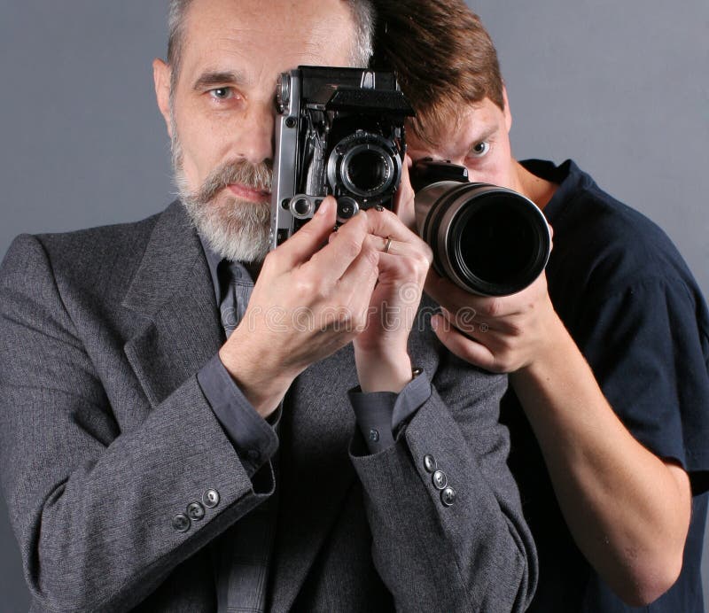Image about various generations of photographers and cameras. Image about various generations of photographers and cameras