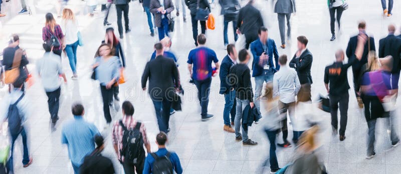 Foule des gens d'affaires Blurred à une foire commerciale photo stock Foule des gens d'affaires Blurred à une foire commerciale photo stock