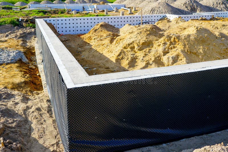 Foundation construction with waterproofing membrane and drainage protection system royalty free stock photos
