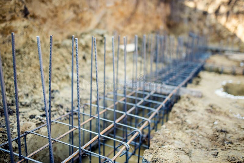 Foundation site of new building, details and reinforcements with steel bars and wire rod