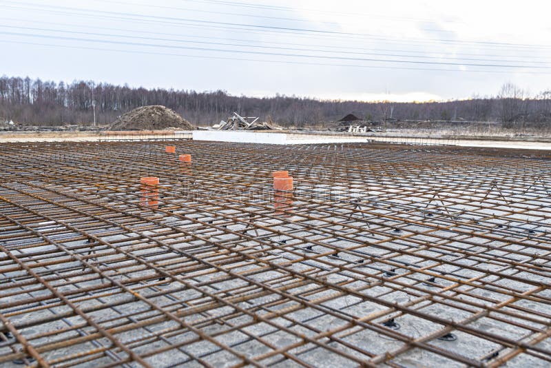 The Foundation Slab is Made of Reinforcement Rods, Bound with Tie Wire