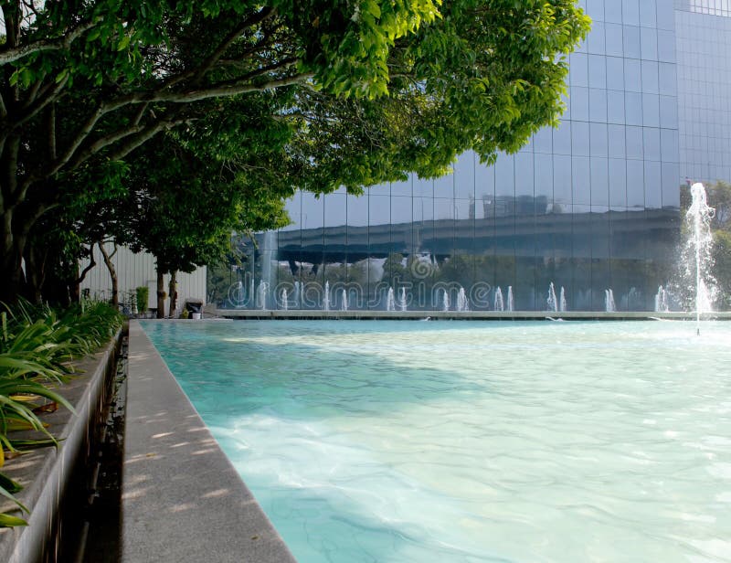 Fountains And The Charlotte Skyline At First Ward Park At Night, In