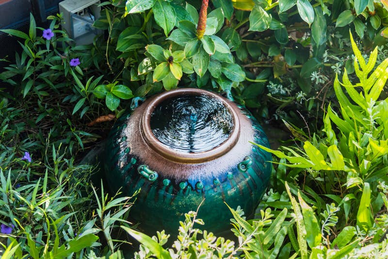 Fountain decoration in the garden made by Clay pottery ceramic royalty free stock image
