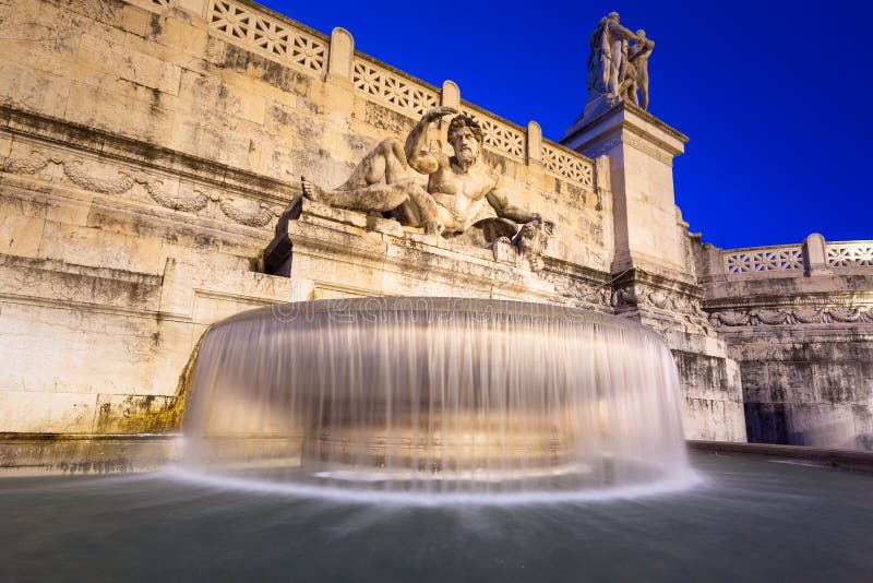 Fountain of the National Monument in Rome at Night, Italy Editorial