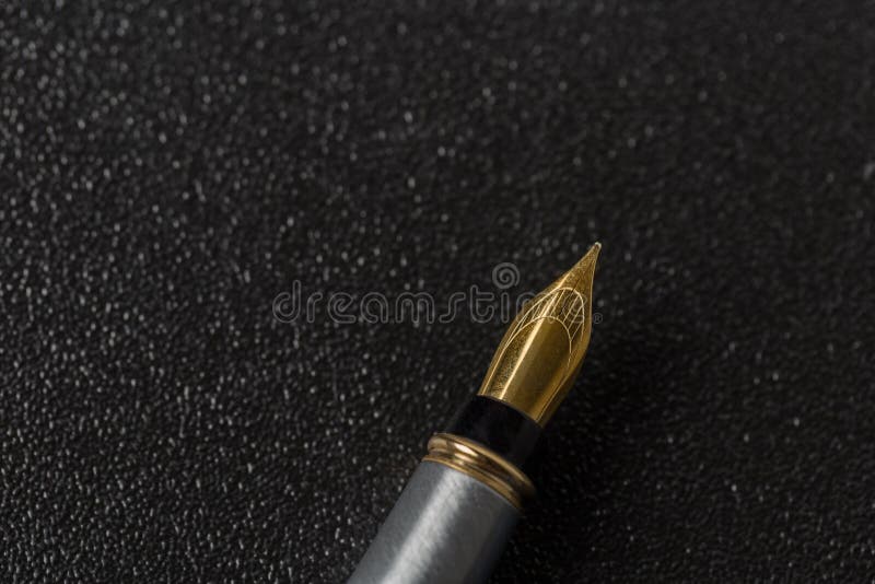 Old Fountain Pen with Clipping Path Write on White Paper Background