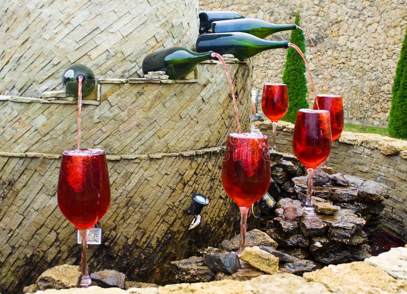 Fountain of red wine stock photo. Image of glass, winery 19636856