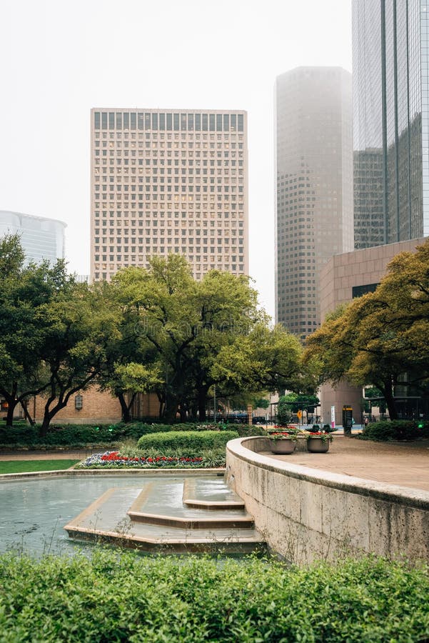 Fountains at Hermann Square and Buildings in Downtown Houston, Texas
