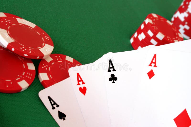 Four aces in hand stock image
