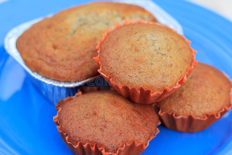 Four banana muffin cakes stock image. Image of eating 27945635