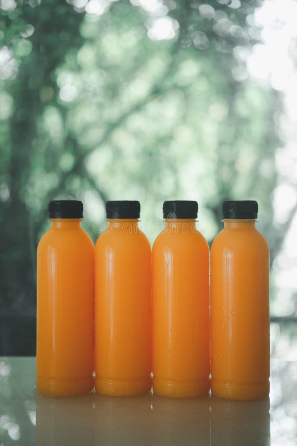 Four Bottle of Fresh Orange Juice Stock Photo Image of food, bottle 222968716