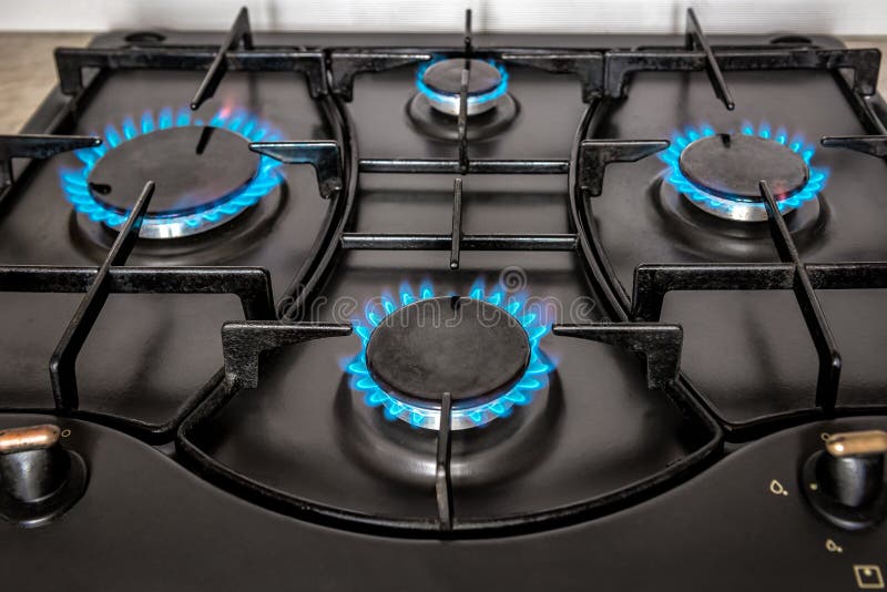 Four burning gas stove stock photo. Image of natural 268942186