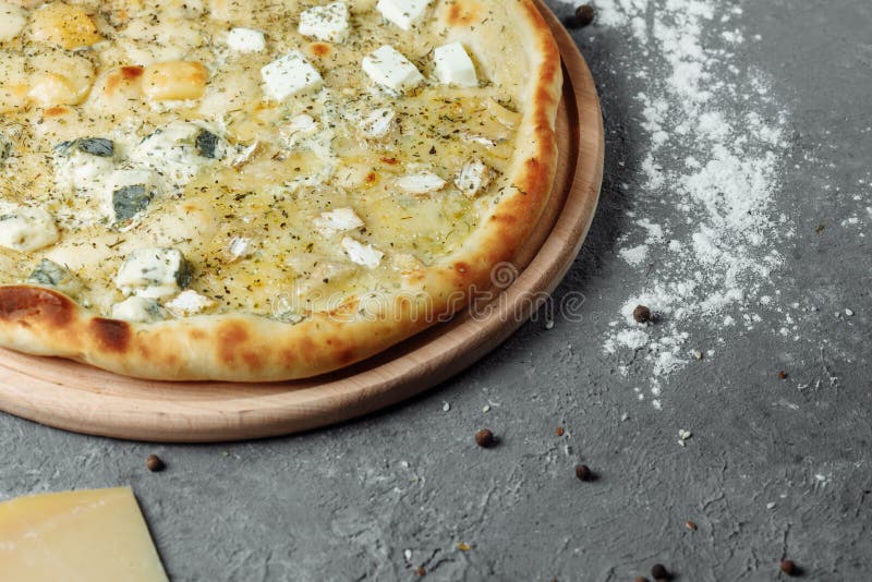 Four Cheese Pizza, Italian Pizza. Pizza Stuffed with Four Varieties of