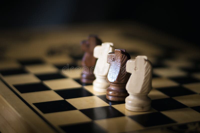 Four Chess Piece Knight on a Chess Board Stock Photo - Image of board,  army: 138703686