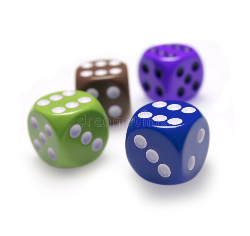 Four colored dice each with the figure 6 in the upper face - concept of success