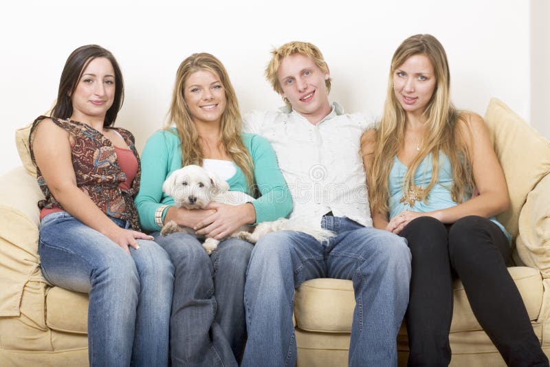 Four friends and a dog royalty free stock photos Four friends and a dog royalty free stock photos