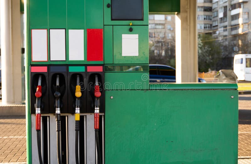 Four Fuel Pumps at a Gas Station. Stock Photo Image of pipe, pump