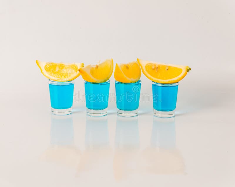 Glasses With Blue Green And Red Kamikaze Glamorous Drinks Mixed Drink  Poured Into Shot Glasses Stock Photo - Download Image Now - iStock