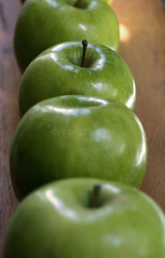 Four green apples stock photo. Image of depth, cook, vegetables 338136