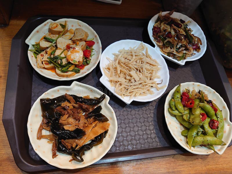 Four kinds of appetizers in a restaurant royalty free stock photos