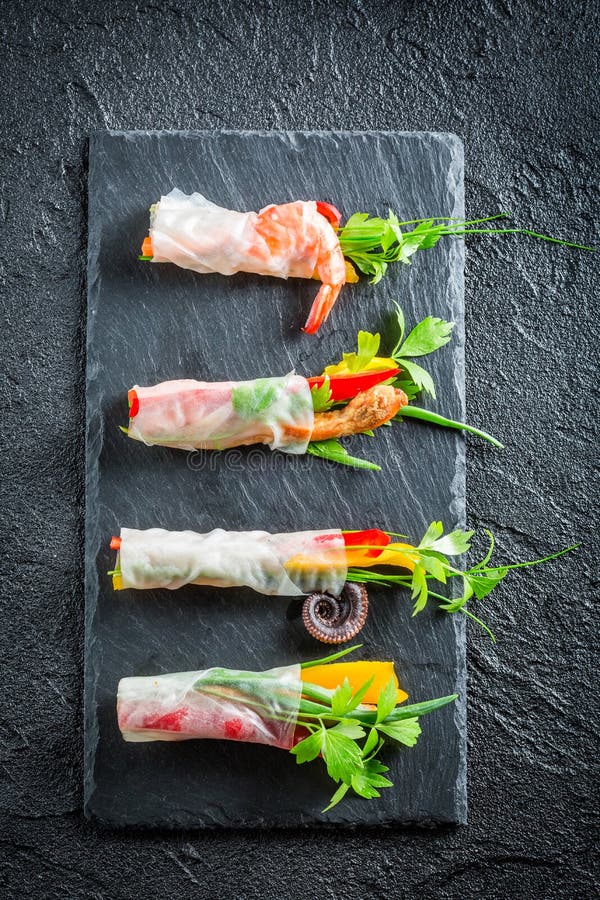 Four kinds of spring rolls with seafood stock images