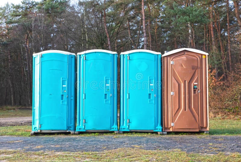Four Mobile Toilets on a Row Stock Image Image of toilet, urination