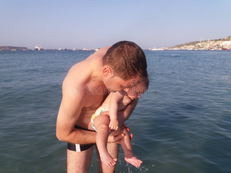 Month Old Baby Boy First Time Swimming in the Sea Stock Photo - Image of life, caucasian: 97972384