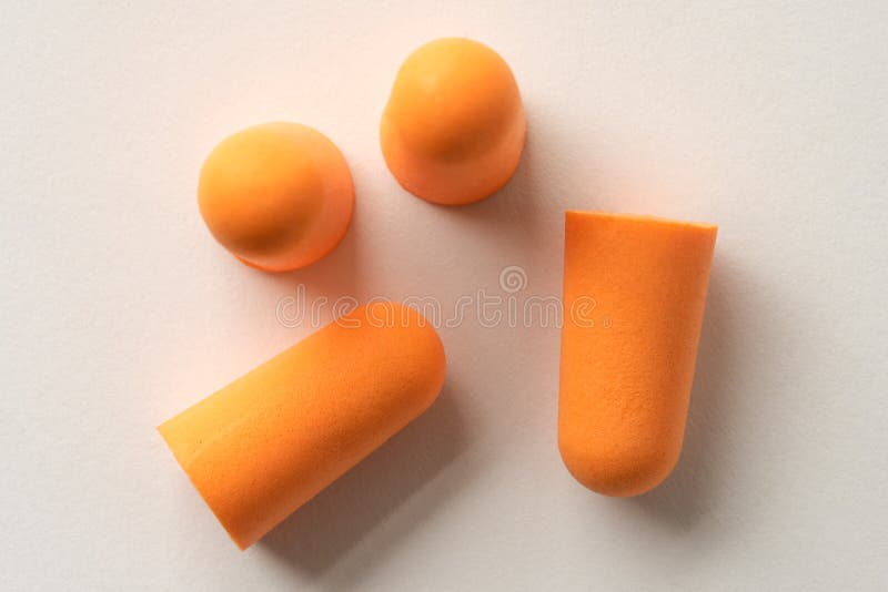 Four Orange Foam Ear Plugs stock image. Image of sponge 244684907