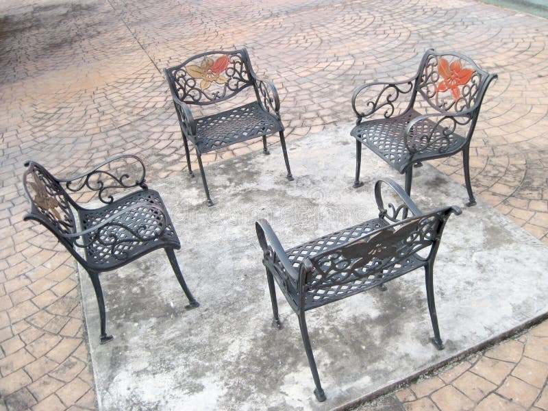 Four Outdoor Generic Public chairs royalty free stock photos