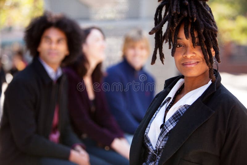 Four People with One Woman as Focal Point stock photo Four People with One Woman as Focal Point stock photo
