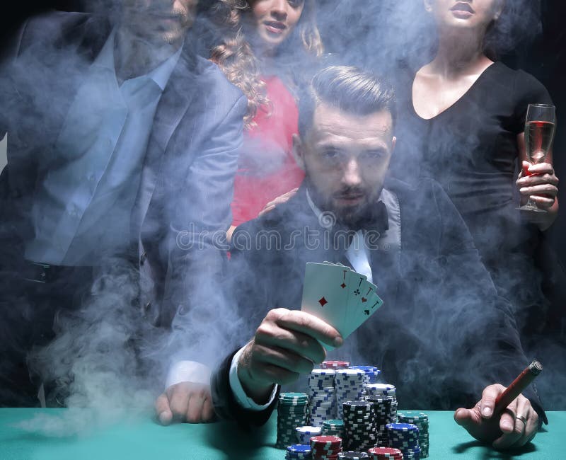 Four people toasting with champagne at roulette in casino royalty free stock photos Four people toasting with champagne at roulette in casino royalty free stock photos