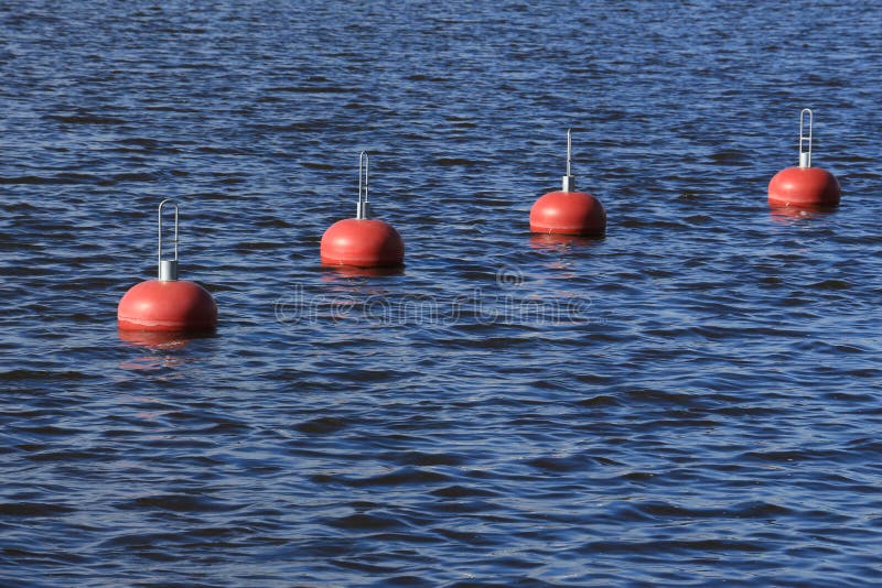 Red buoys on the water