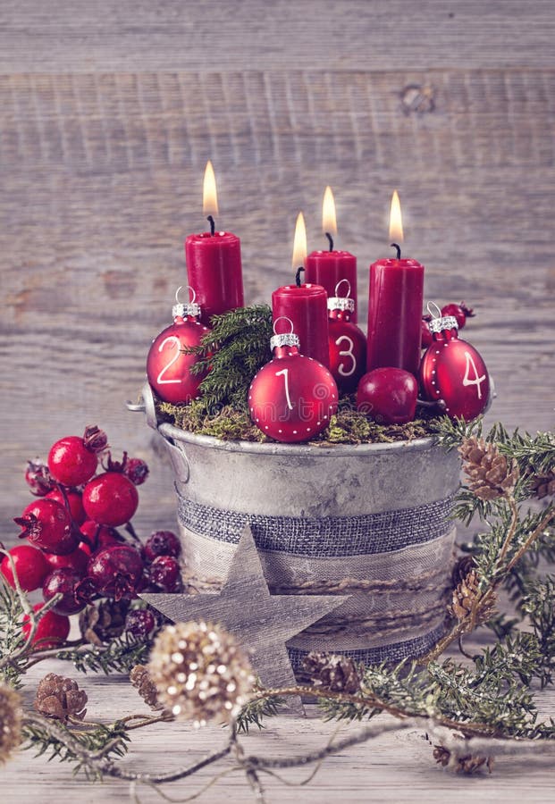 Four red christmas candle