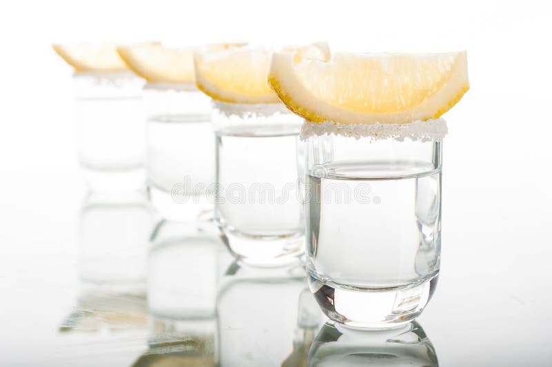 Four Shots of Vodka with Lemon Stock Image Image of horizontal, tequila 57583373