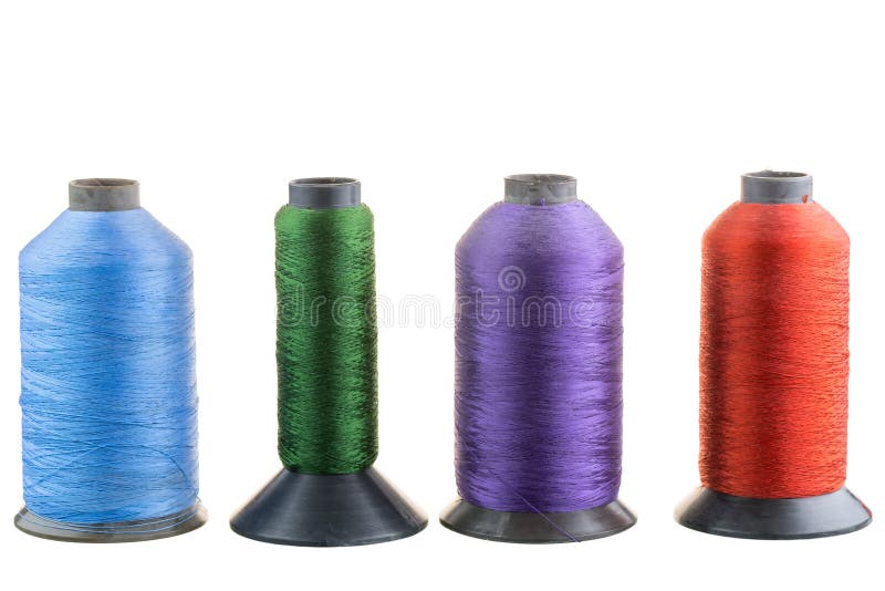 Four spools of silk thread in a row