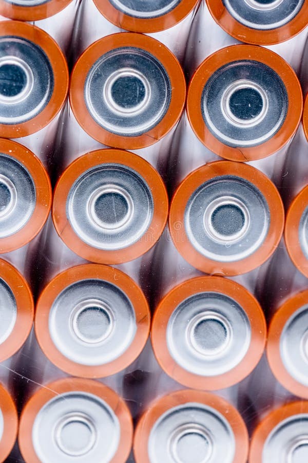 Four Stacks of AA Alkaline Batteries.. Stock Photo Image of white