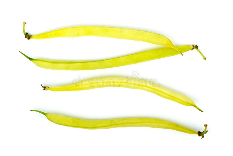 Four yellow wax bean pods isolated on the white background