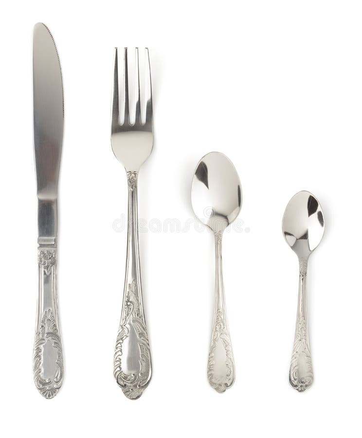 Fourchette, couteau et cuillère d'isolement sur le blanc photo libre de droits Fourchette, couteau et cuillère d'isolement sur le blanc photo libre de droits