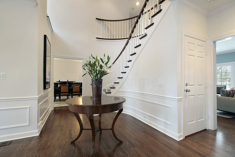 Foyer with curved staircase