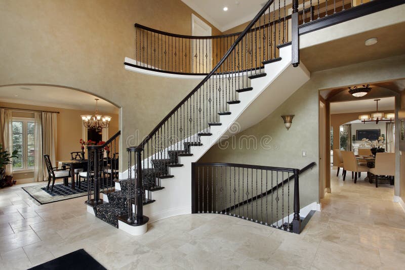Foyer With Curved Staircase Stock Image - Image Of Living, Staircase:  17279743