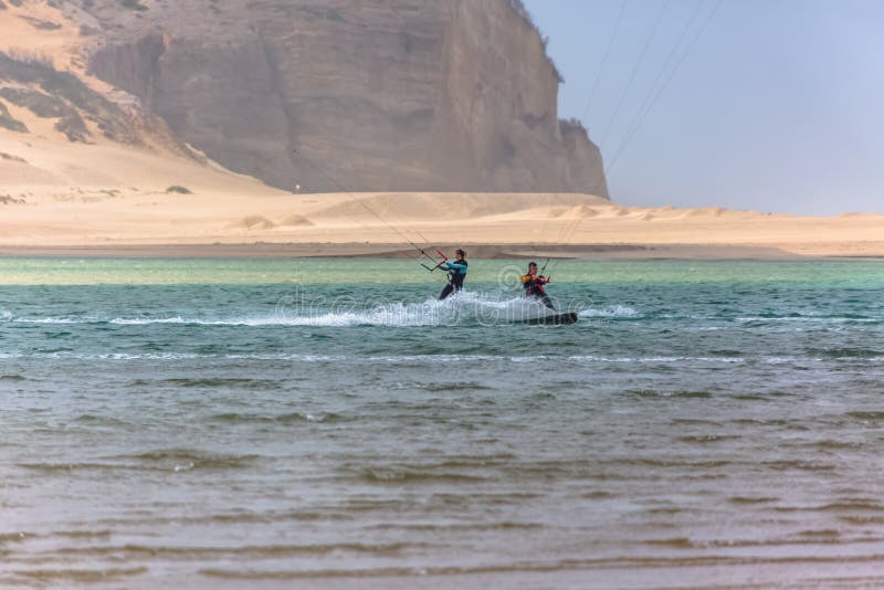 View of a professionals sports practicing extreme sports Kite-boarding at the Obidos lagoon