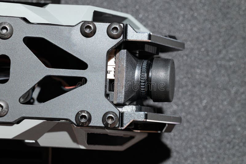 Fpv drone workshop framework design carbon plastic and metallic elements of top and front sides around gimbal camera stock images